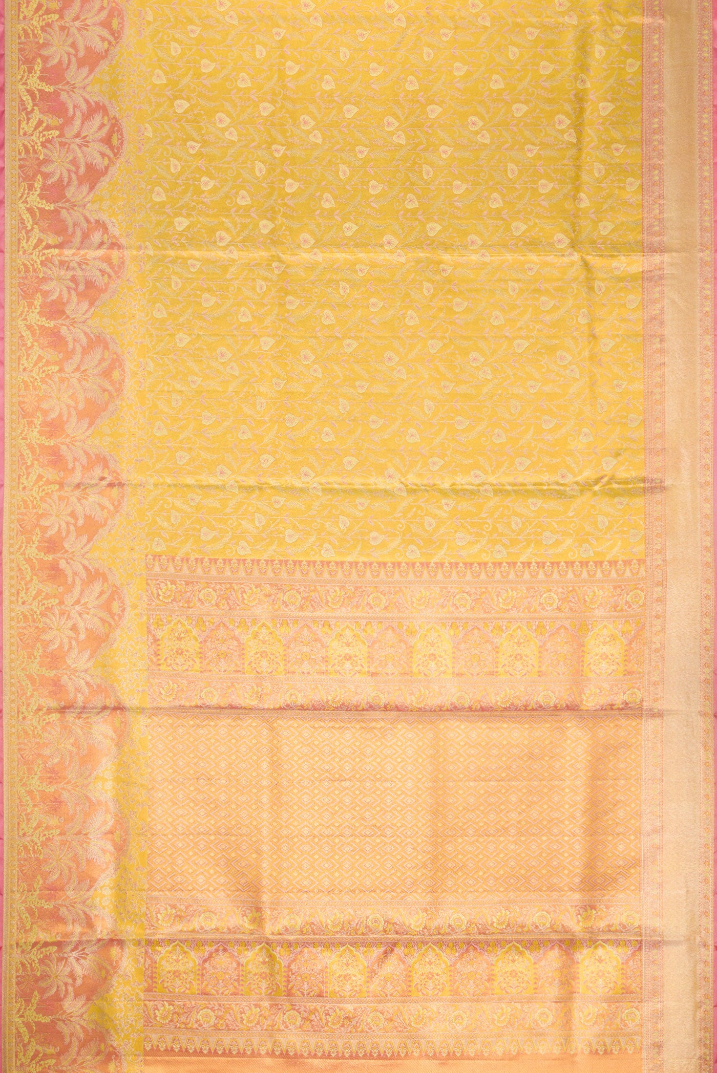Flat view of Yellow Dual Tone Kanjivaram Tissue Silk Saree with Zari Brocade on the body and Fancy Border. 