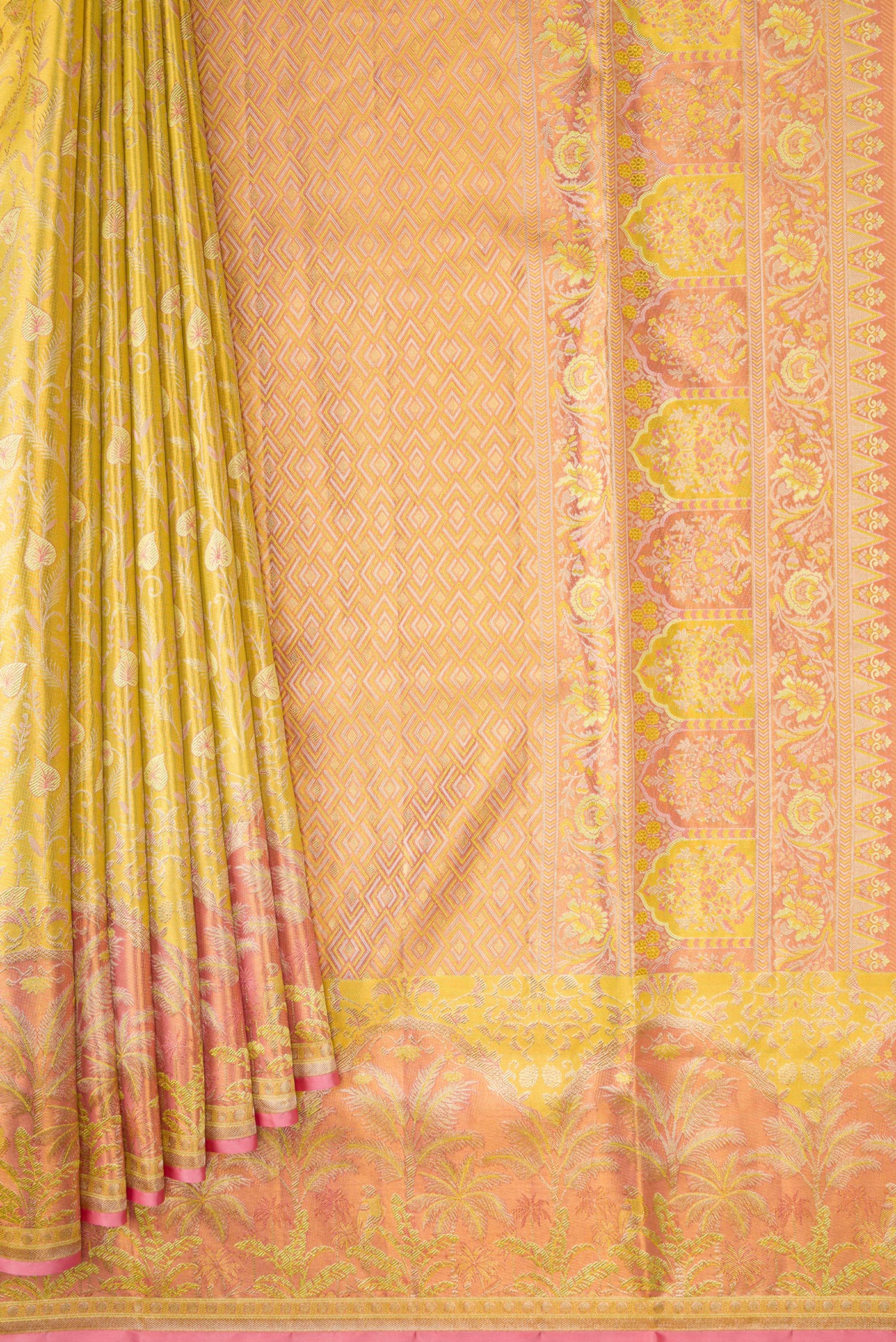Pleats and pallu of Yellow Dual Tone Kanjivaram Tissue Silk Saree with Zari Brocade on the body and Fancy Border. 