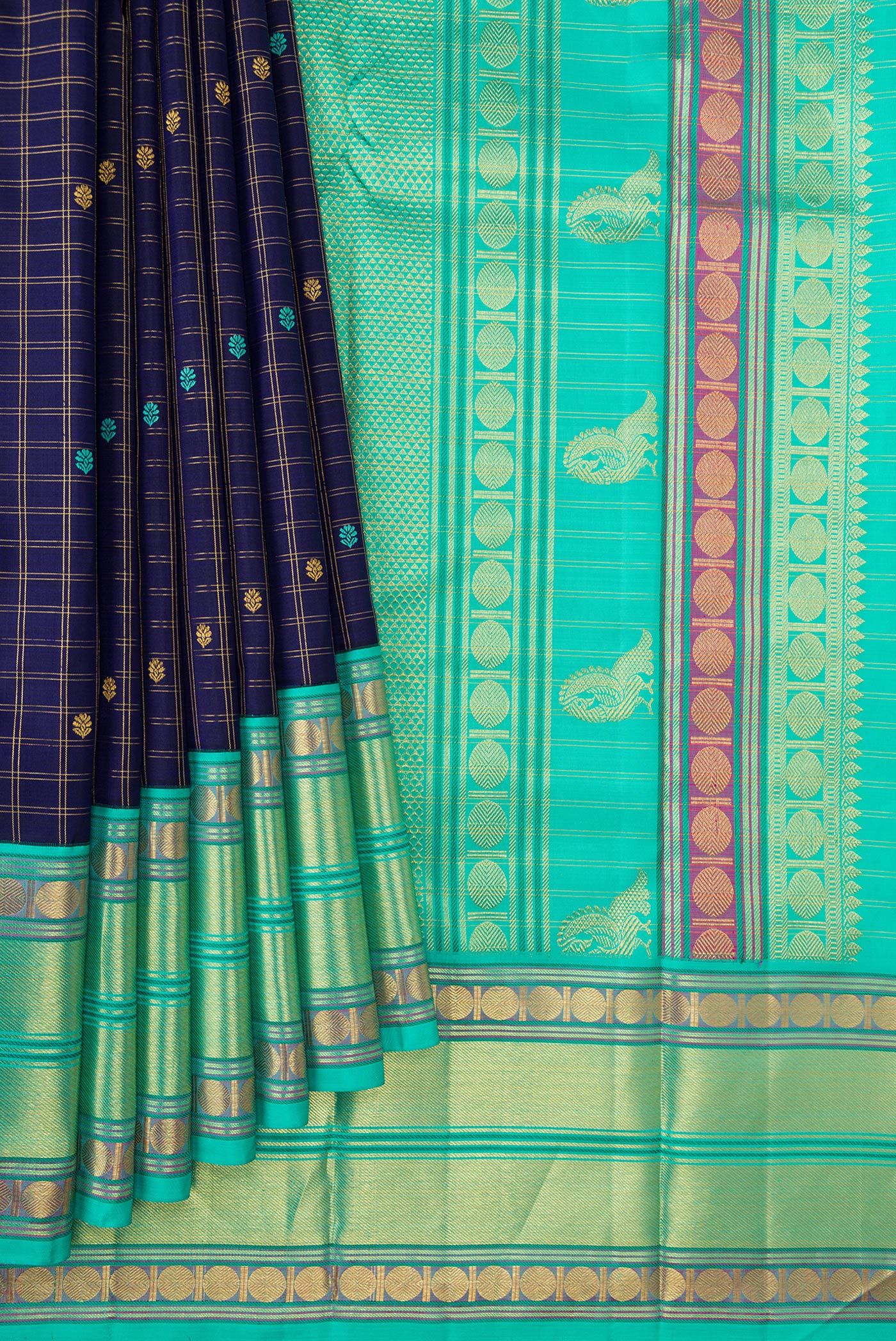 Pleats and pallu of Royal Blue Dual Tone Kanjivaram Silk Saree with Zari Butta on the body and Zari Border. 