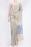 Blue Grey Dual Tone Tussar Silk Saree with Zari Butta on the body and Zari Border.  displayed on a mannequin