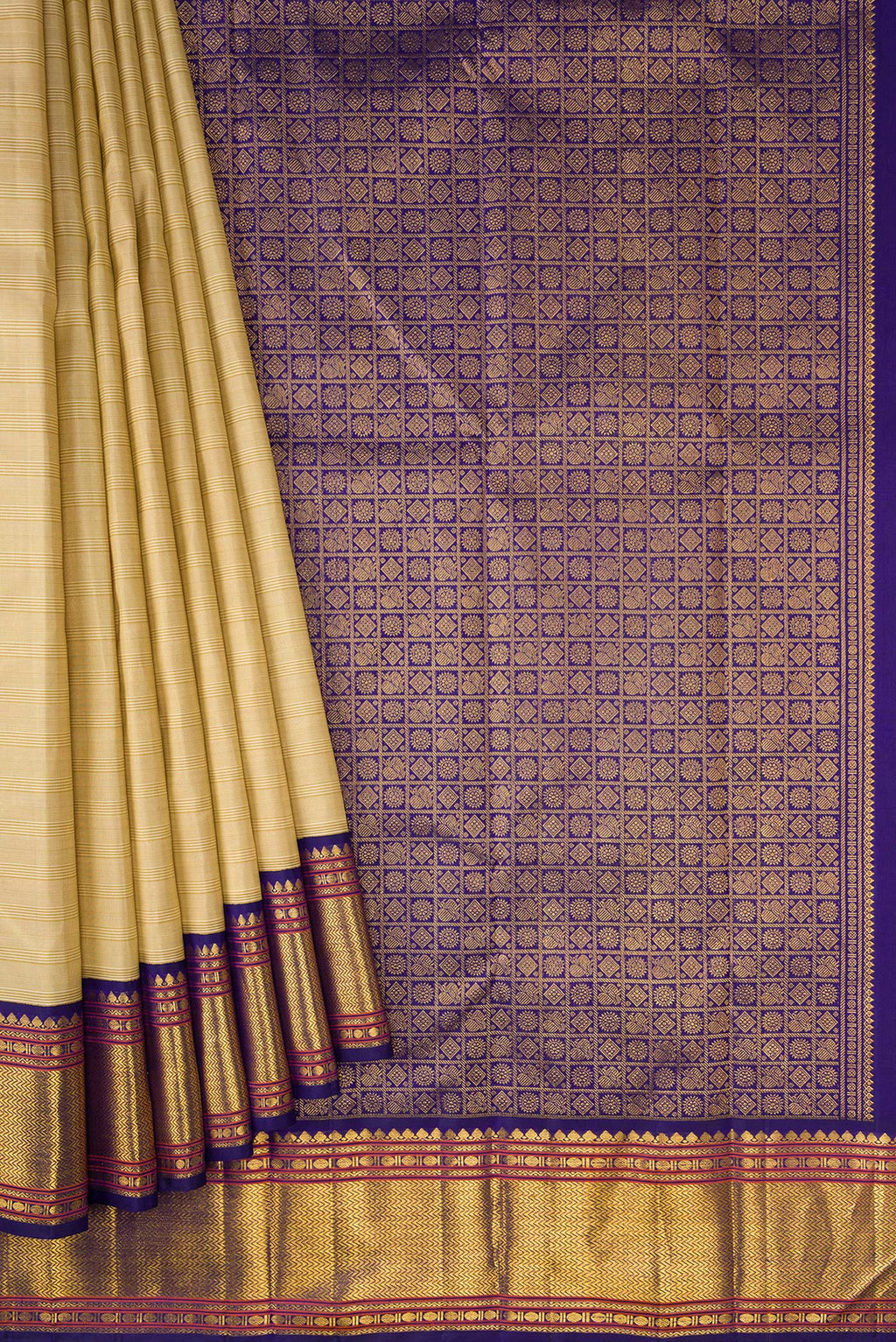 Pleats and pallu of Beige Dual Tone Kanjivaram Silk Saree with Plain Body and Zari Border. 