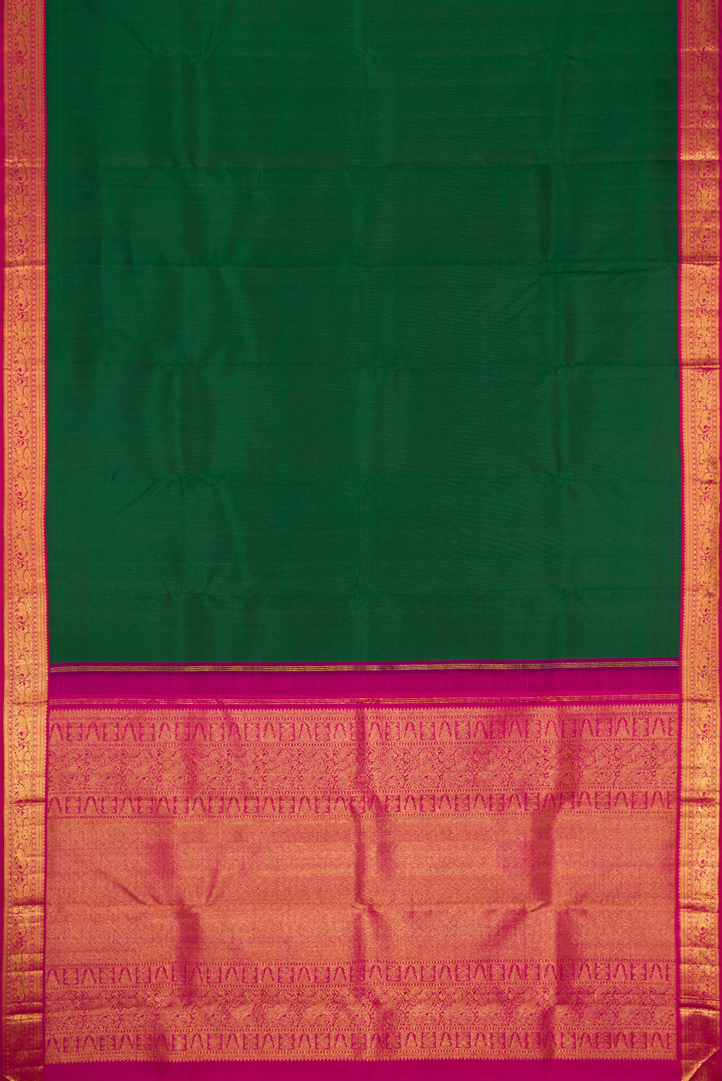 Flat view of Bottle Green Dual Tone Kanjivaram Silk Saree with Plain Body and Zari Border. 