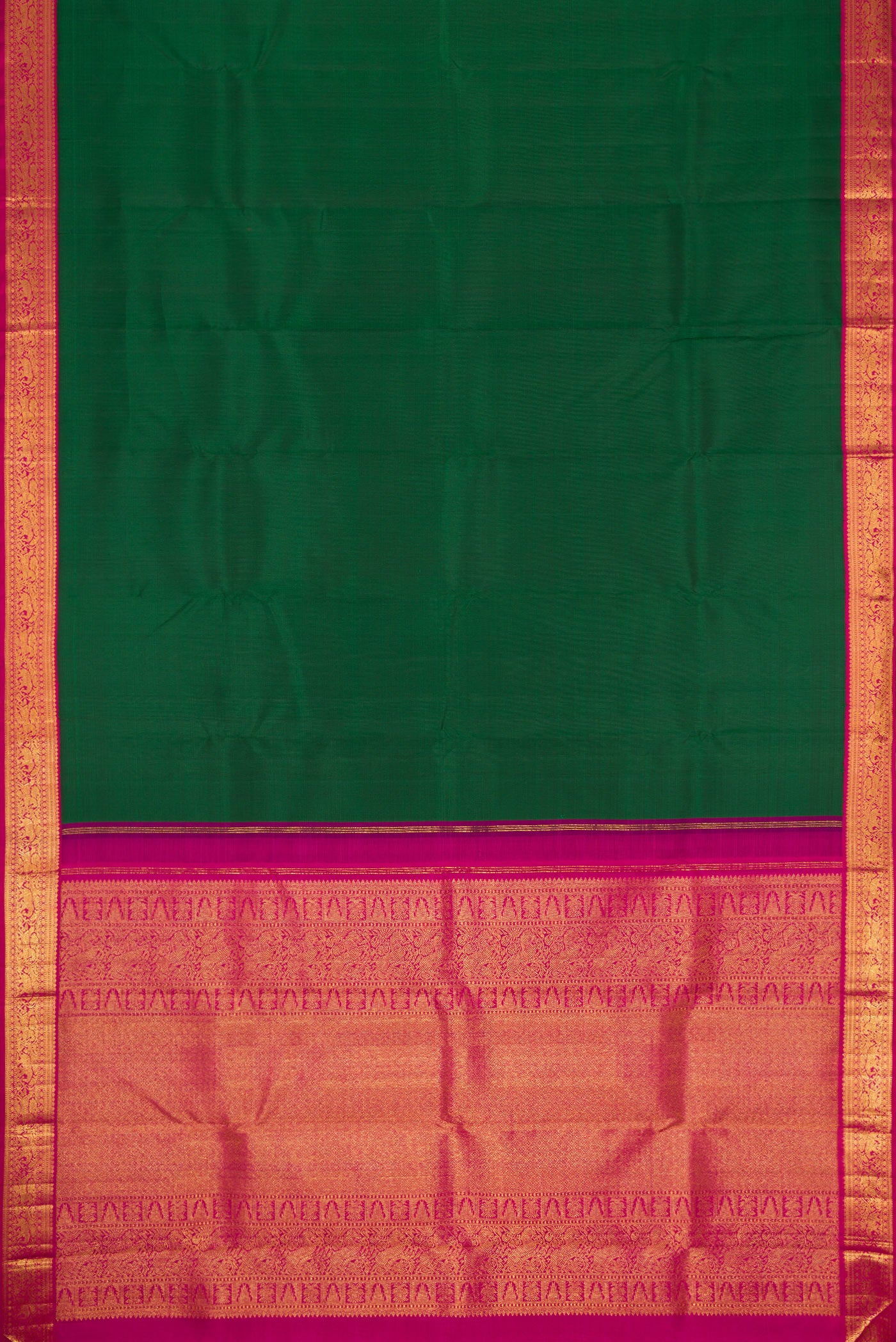 Flat view of Bottle Green Dual Tone Kanjivaram Silk Saree with Plain Body and Zari Border. 