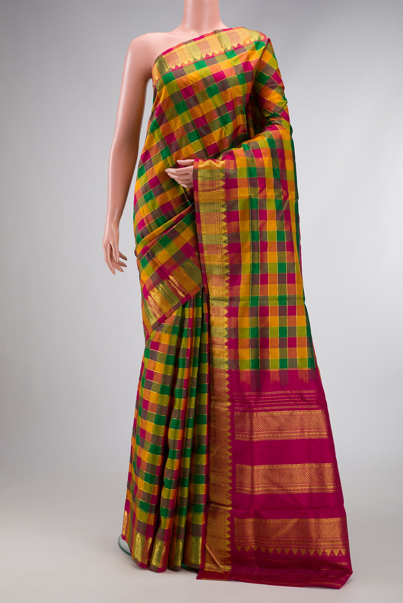 Pure Silk Pure Zari Maroon, Bottle Green and Musturd Color Kanchipuram Nine Yards Saree with Checked design on the body and Zari Border.  displayed on a mannequin