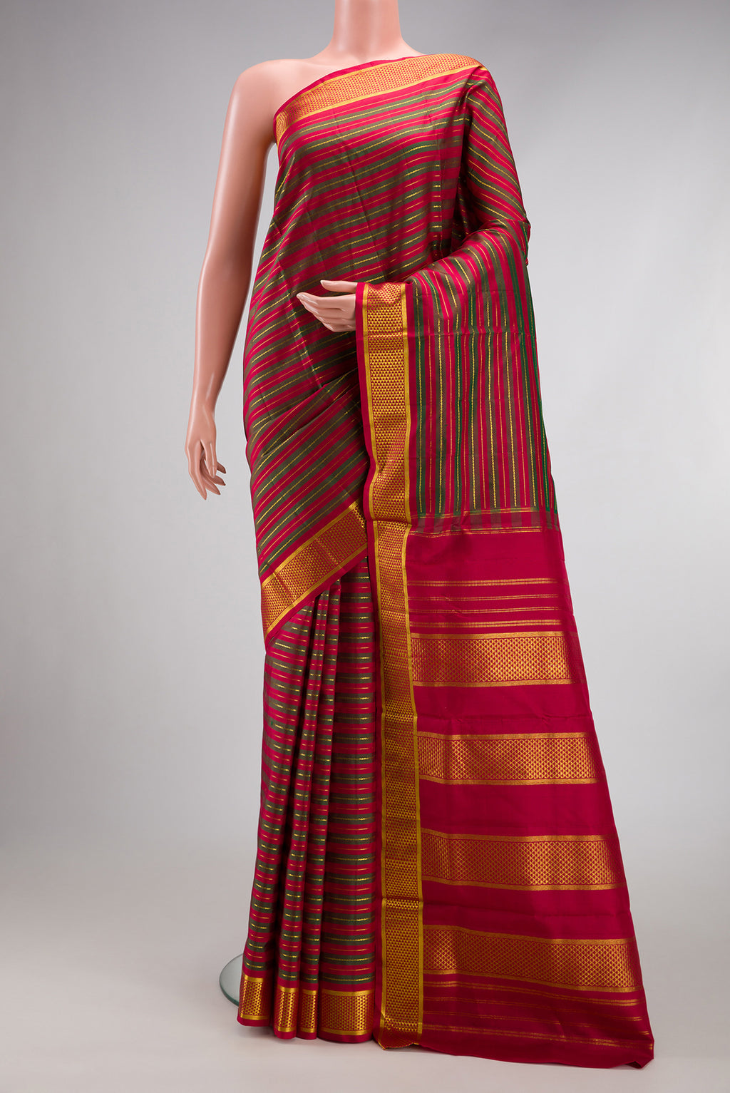 Maroon Dual Tone Kanchipuram Silk Nine Yards Saree with Stripes on the body and Zari Border.  displayed on a mannequin