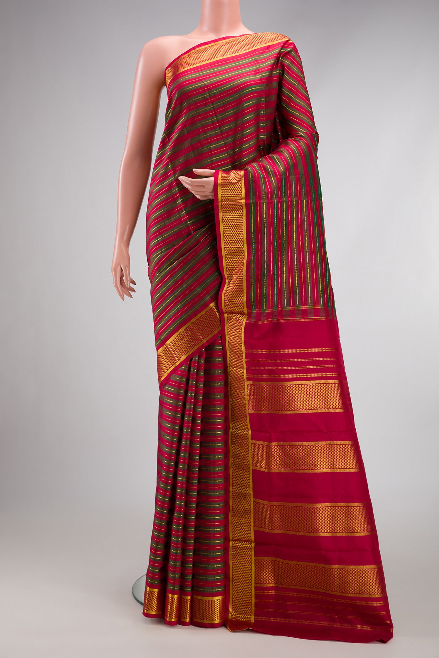 Maroon Dual Tone Kanchipuram Silk Nine Yards Saree with Stripes on the body and Zari Border.  displayed on a mannequin