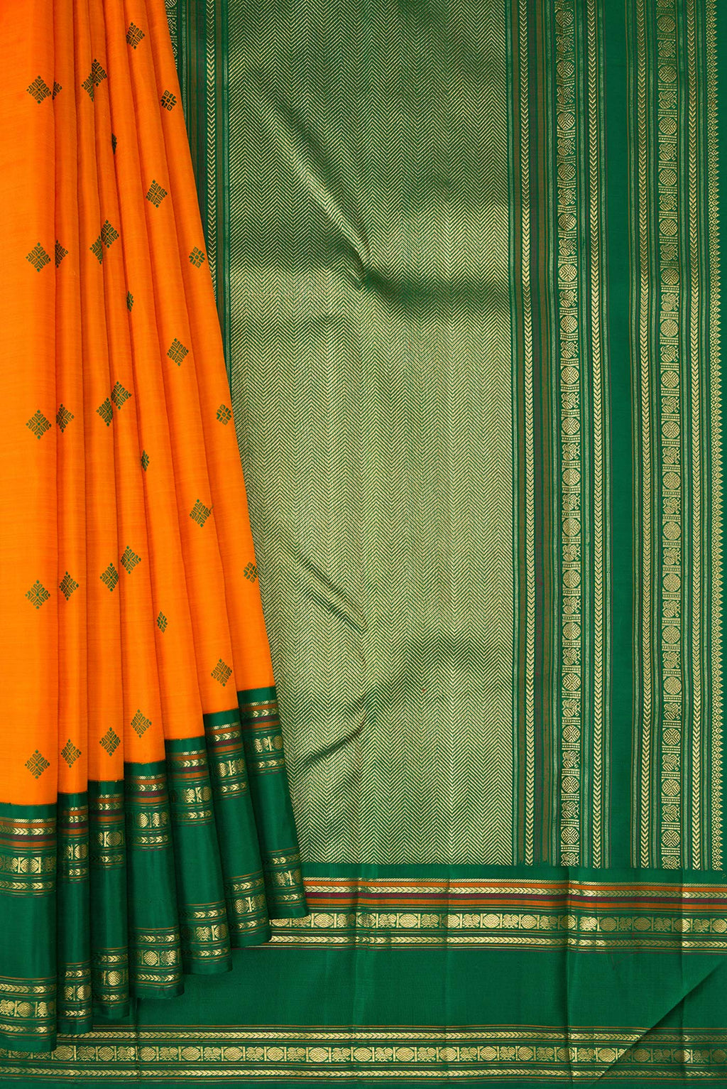 Pleats and pallu of Pure Silk Pure Zari Orange Dual Tone Kanchipuram Saree with Thread Butta on the body and Zari Border. 