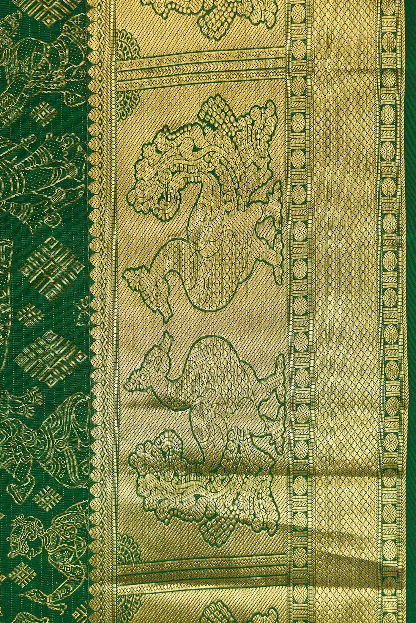 Border image of Green Dual Tone Kanchipuram Silk Saree with Zari Butta on the body and Zari Border. 