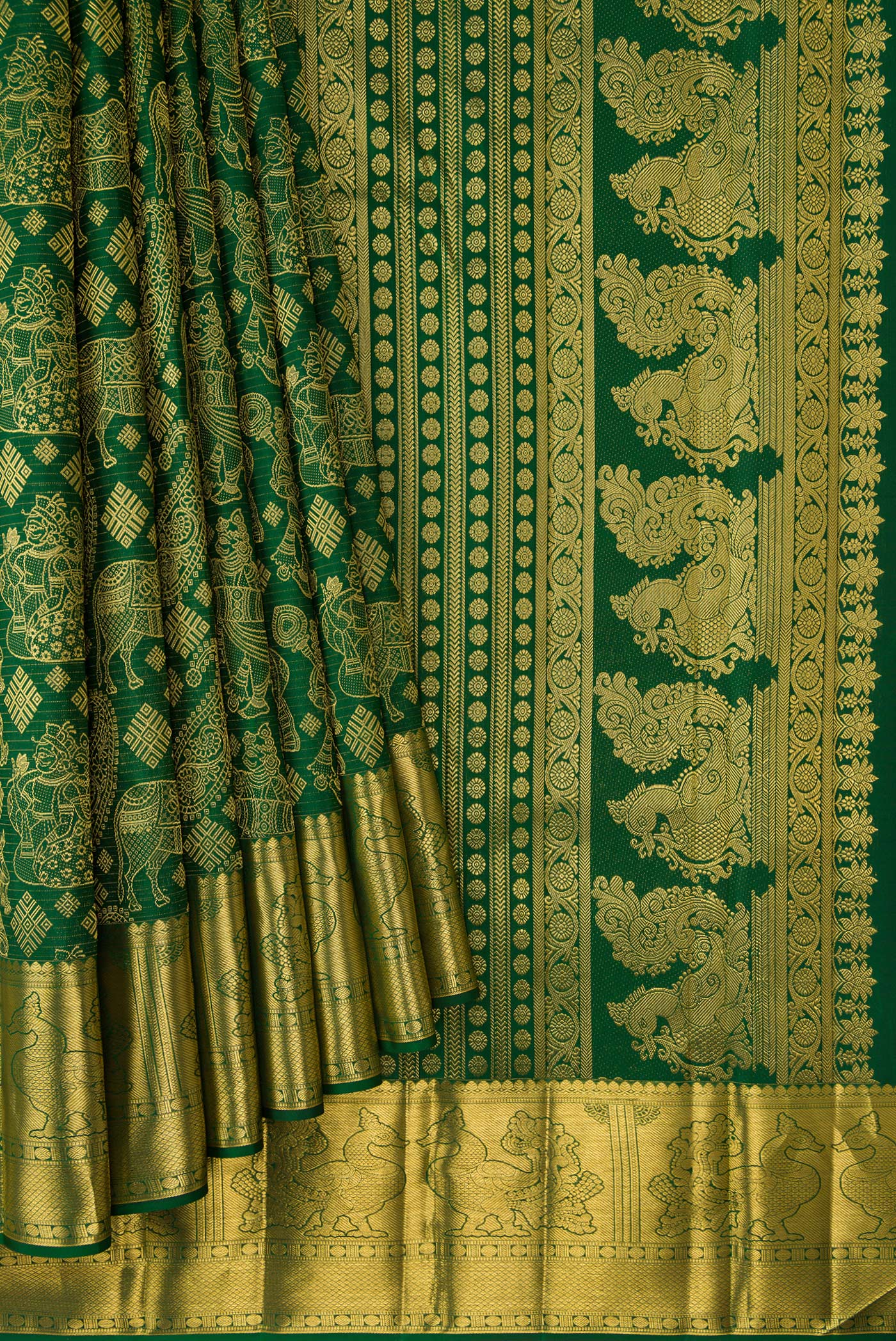 Pleats and pallu of Green Dual Tone Kanchipuram Silk Saree with Zari Butta on the body and Zari Border. 