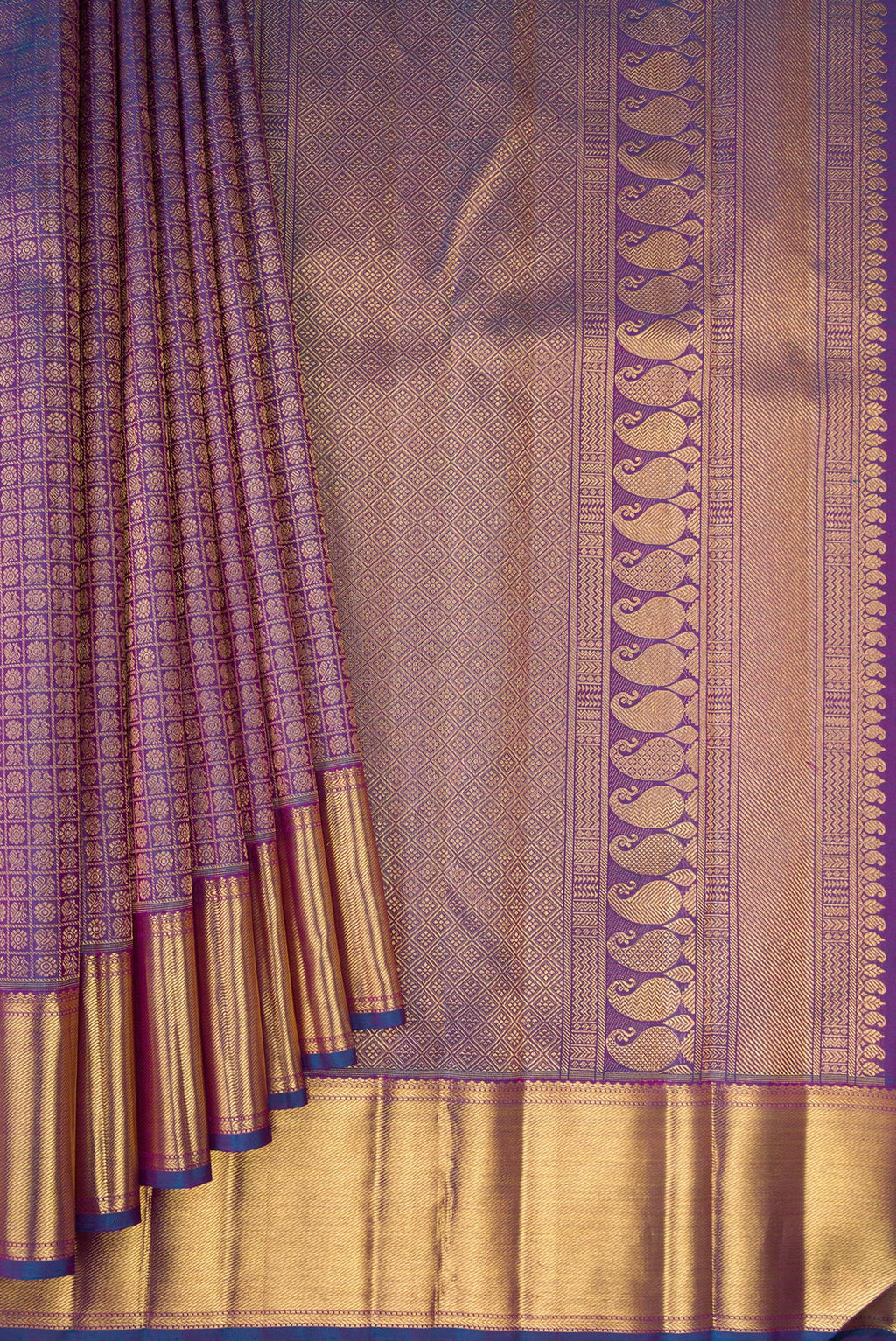 Pleats and pallu of Pure Silk Pure Zari Peacock Blue Dual Tone Kanjivaram Saree with Zari Brocade on the body and Zari Border. 