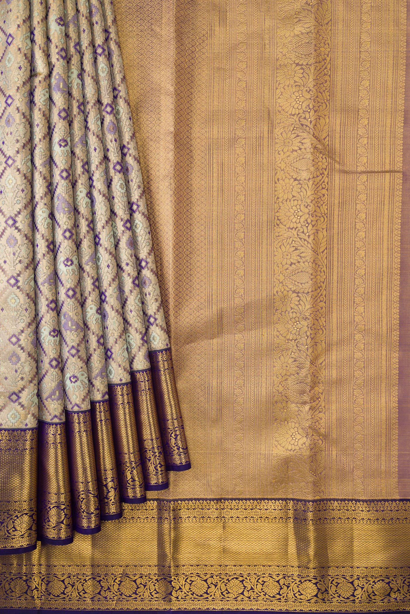 Pleats and pallu of Gold Dual Tone Kanchipuram Tissue Silk Saree with Zari Brocade on the body and Zari Border. 