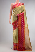 Pista Green Dual Tone Kanjivaram Tissue Silk Saree with Zari Brocade on the body and Zari Border.  displayed on a mannequin