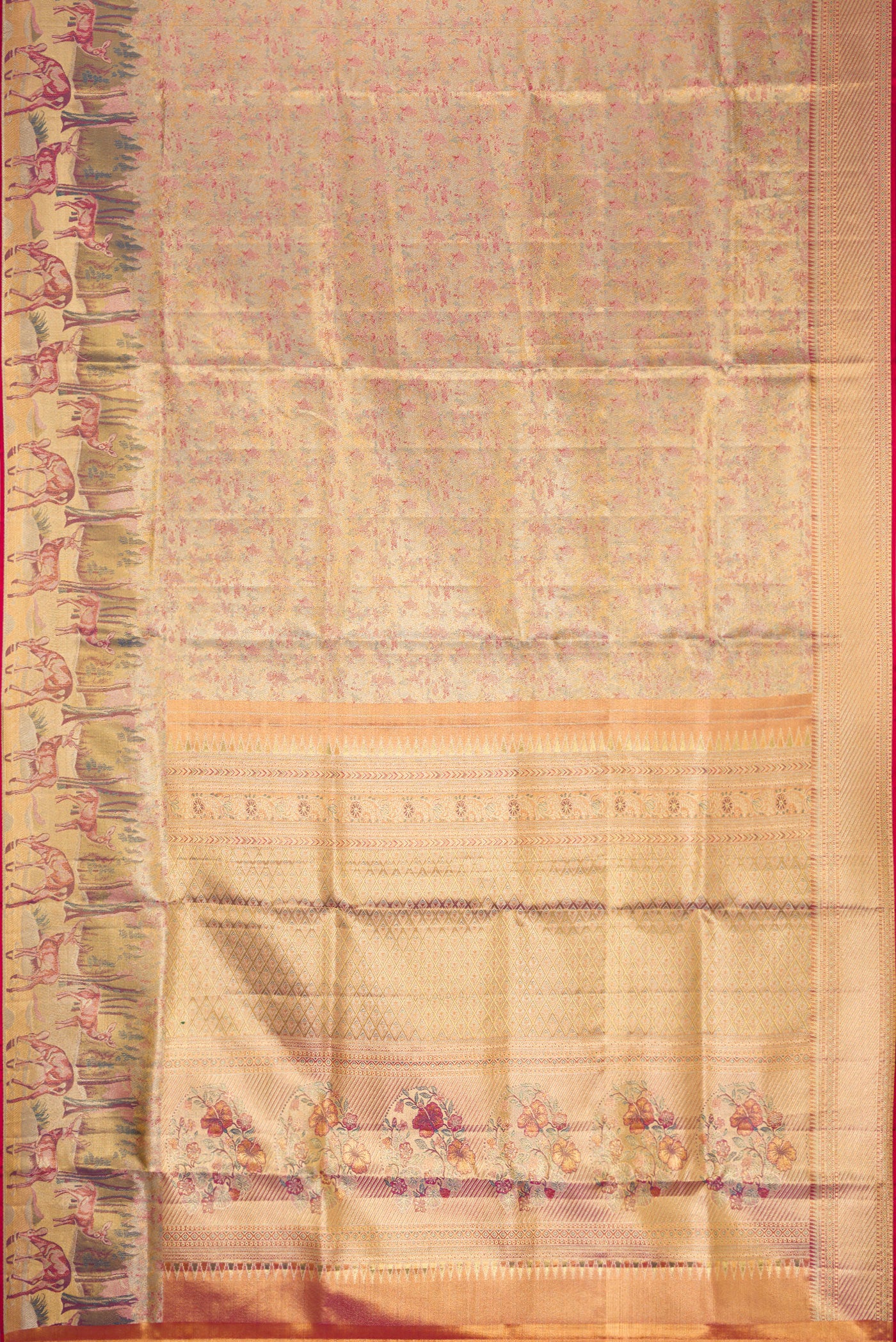 Flat view of Gold Dual Tone Kanjivaram Tissue Silk Saree with Zari Brocade on the body and Fancy Border. 