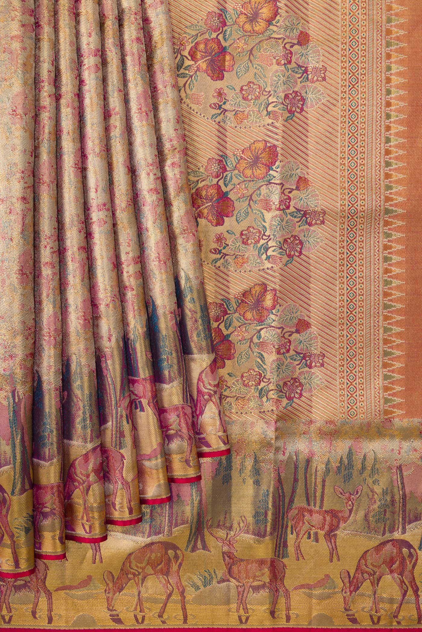 Pleats and pallu of Gold Dual Tone Kanjivaram Tissue Silk Saree with Zari Brocade on the body and Fancy Border. 