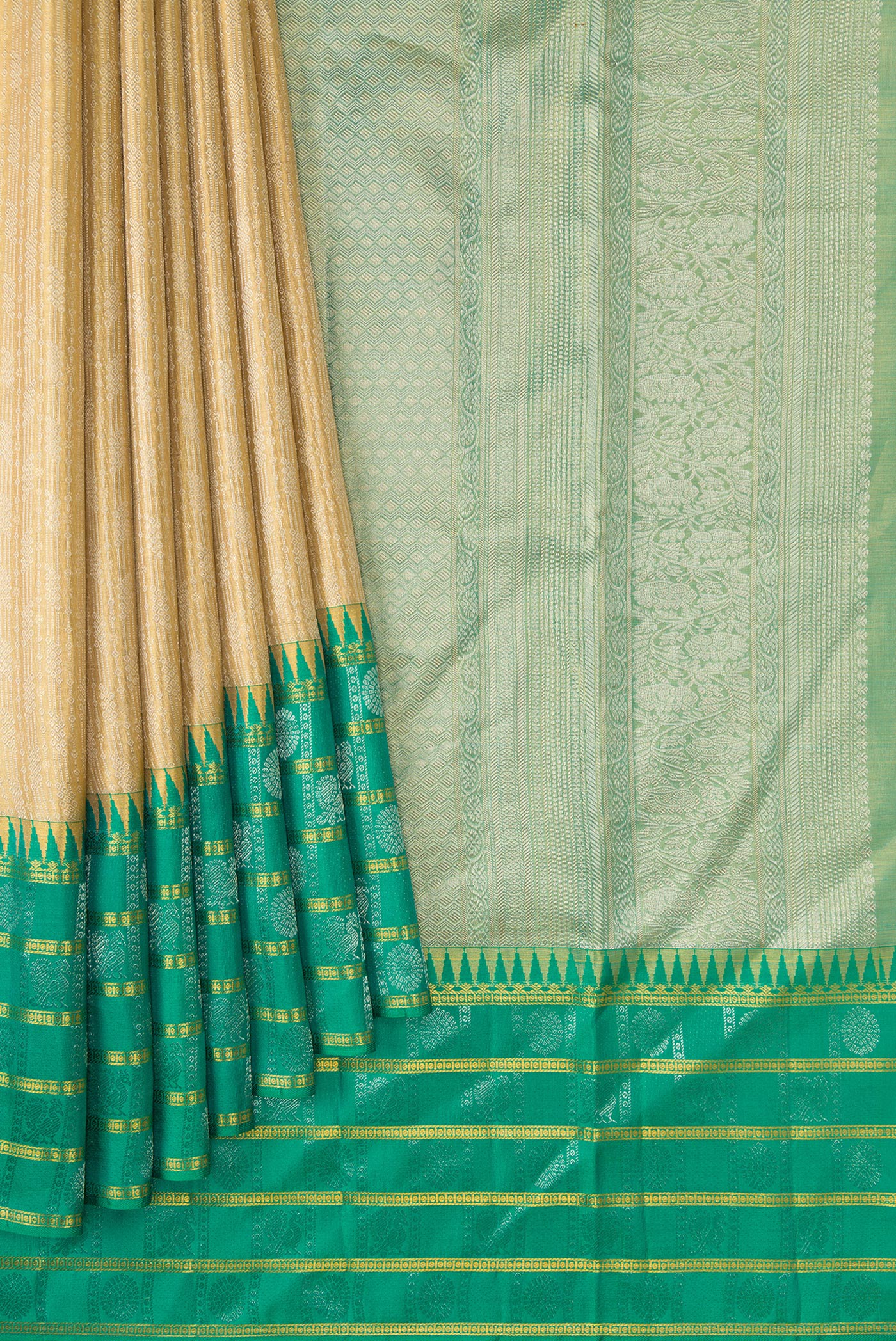 Pleats and pallu of Gold Dual Tone Kanjivaram Tissue Silk Saree with Zari Brocade on the body and Fancy Border. 