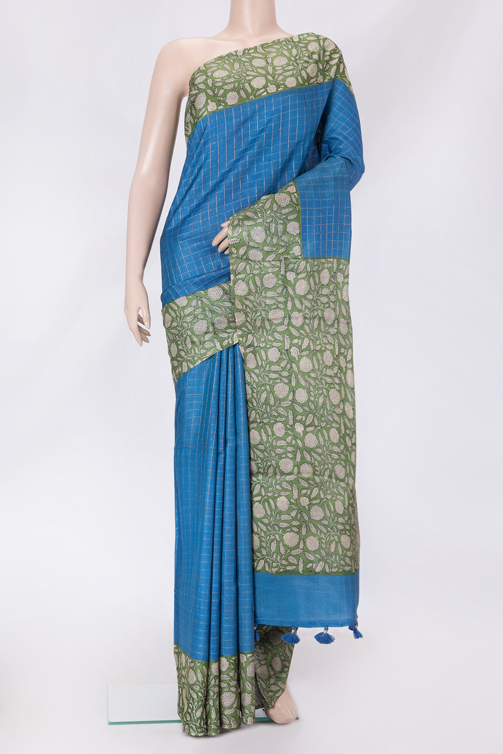 Royal Blue Dual Tone Tussar Silk Saree with Checked design on the body and Printed Border.  displayed on a mannequin