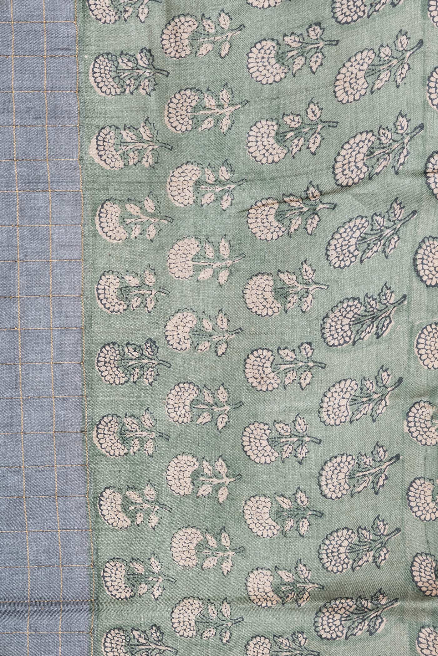 Border image of Grey Dual Tone Tussar Silk Saree with Checked design on the body and Printed Border. 