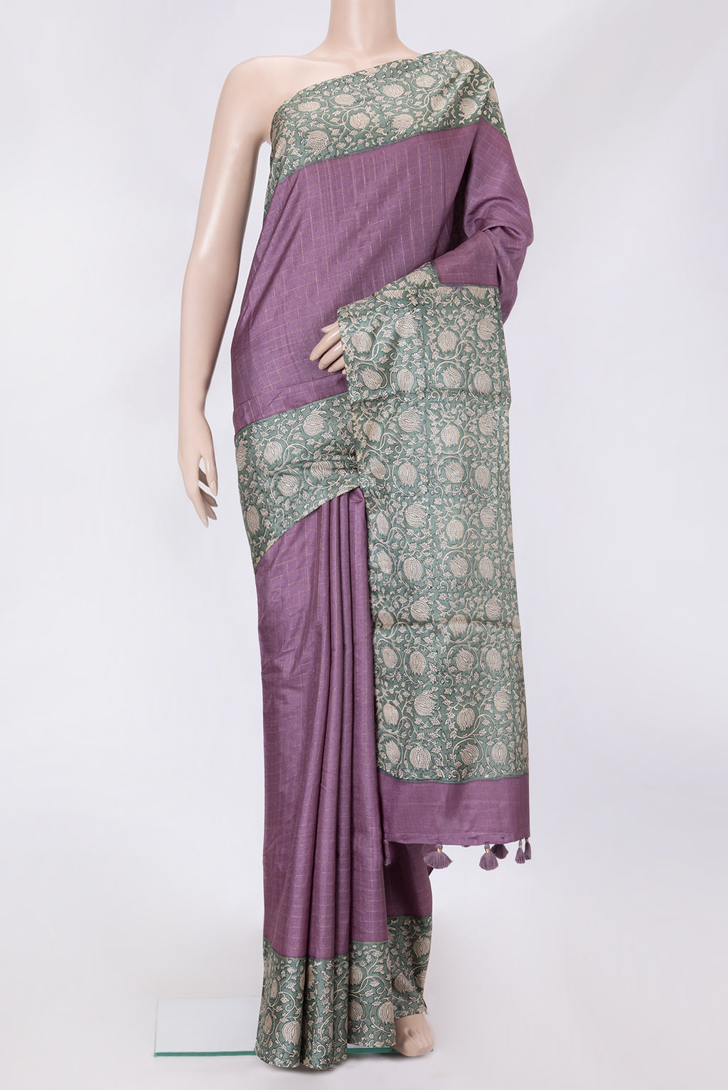 Purple Dual Tone Tussar Silk Saree with Checked design on the body and Printed Border.  displayed on a mannequin