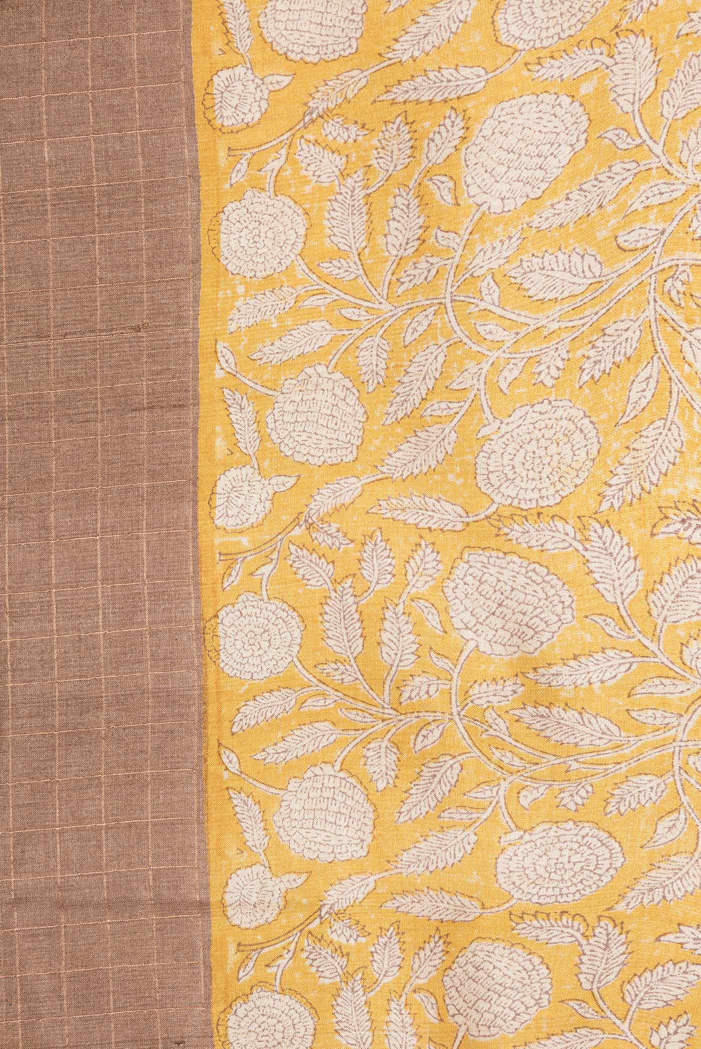 Border image of Brown Dual Tone Tussar Silk Saree with Checked design on the body and Printed Border. 