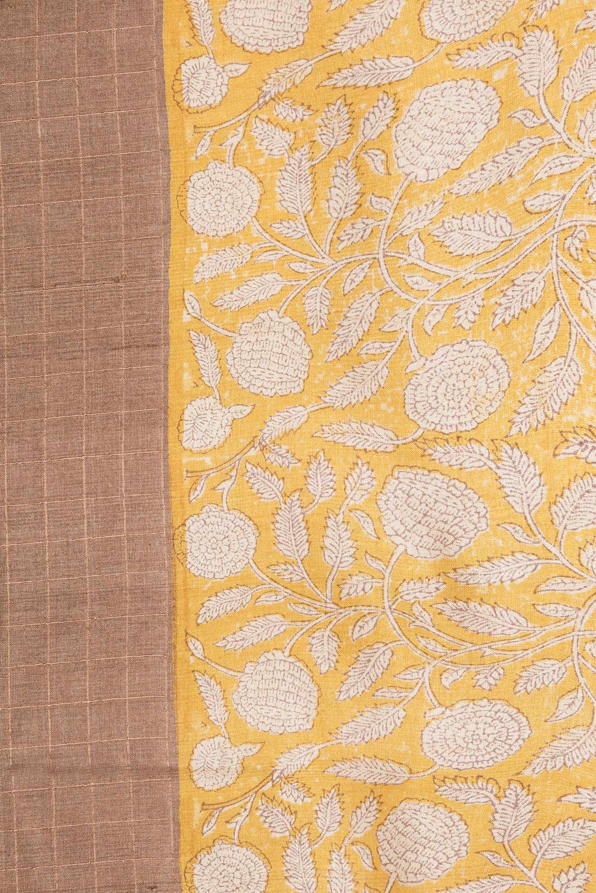 Border image of Brown Dual Tone Tussar Silk Saree with Checked design on the body and Printed Border. 