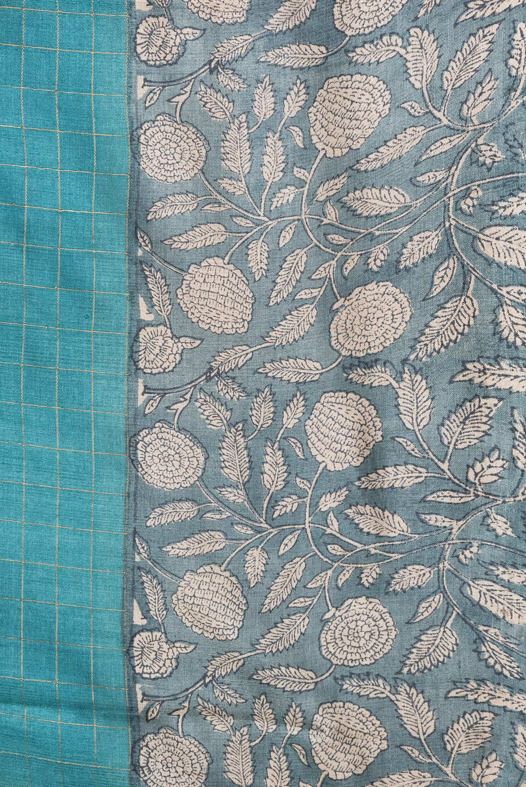 Border image of Sky Blue Dual Tone Tussar Silk Saree with Checked design on the body and Printed Border. 