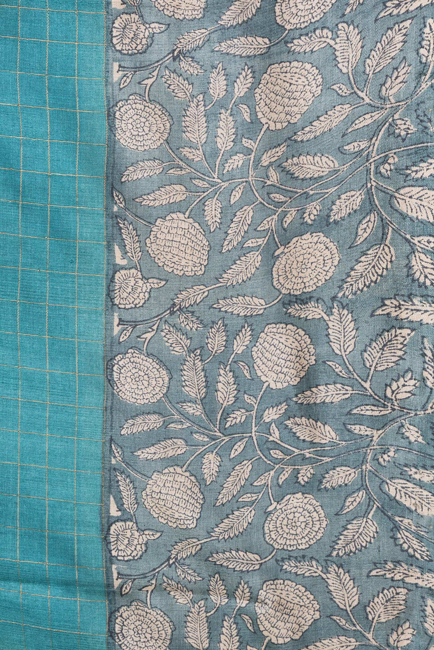 Border image of Sky Blue Dual Tone Tussar Silk Saree with Checked design on the body and Printed Border. 