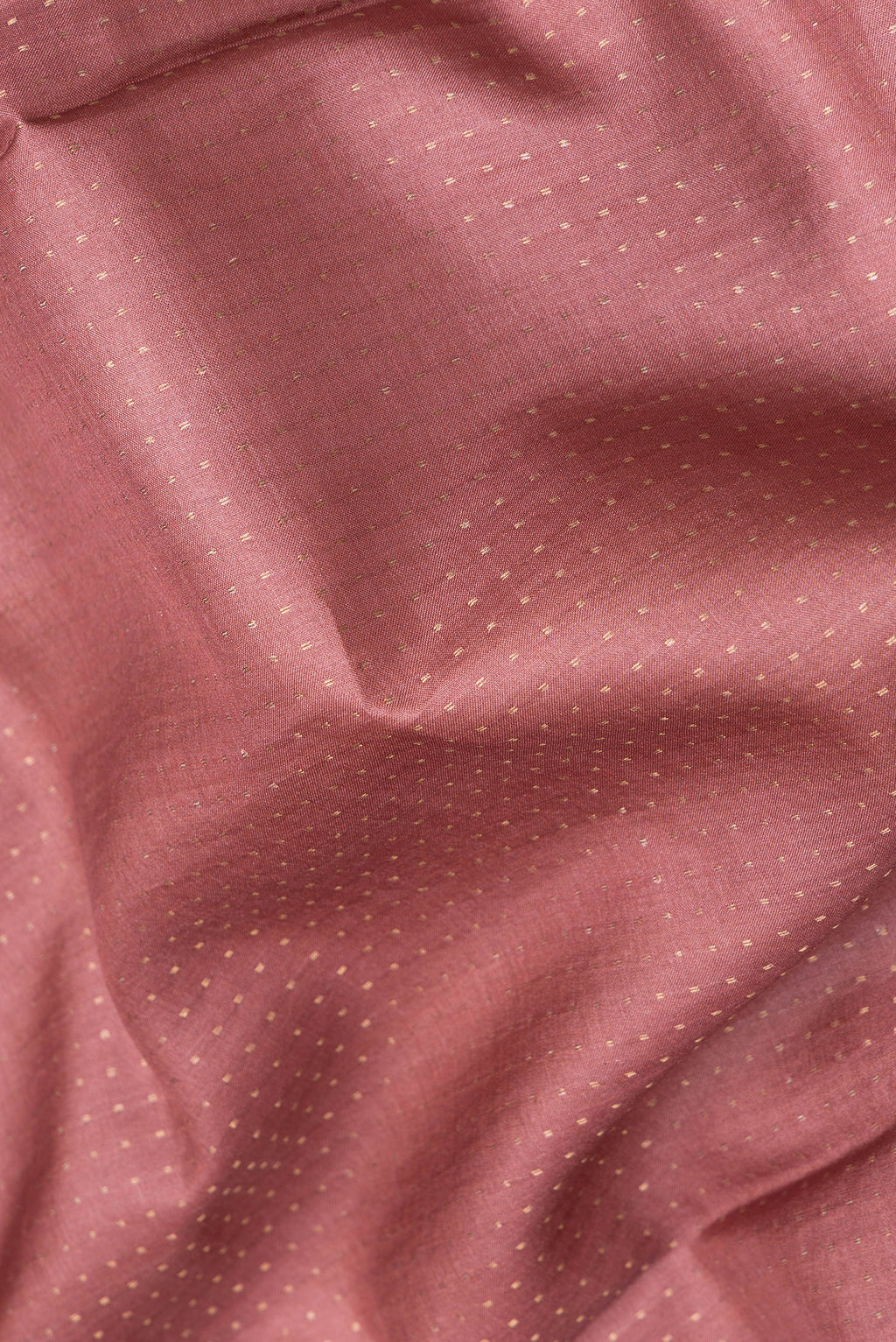 Close up of Mauve Dual Tone Tussar Silk Saree with Stripes on the body and Printed Border.  displaying folds