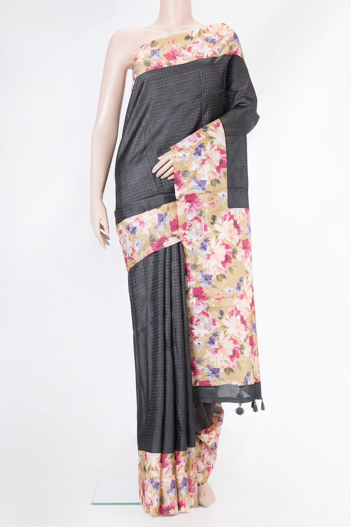 Black Dual Tone Tussar Silk Saree with Stripes on the body and Printed Border.  displayed on a mannequin