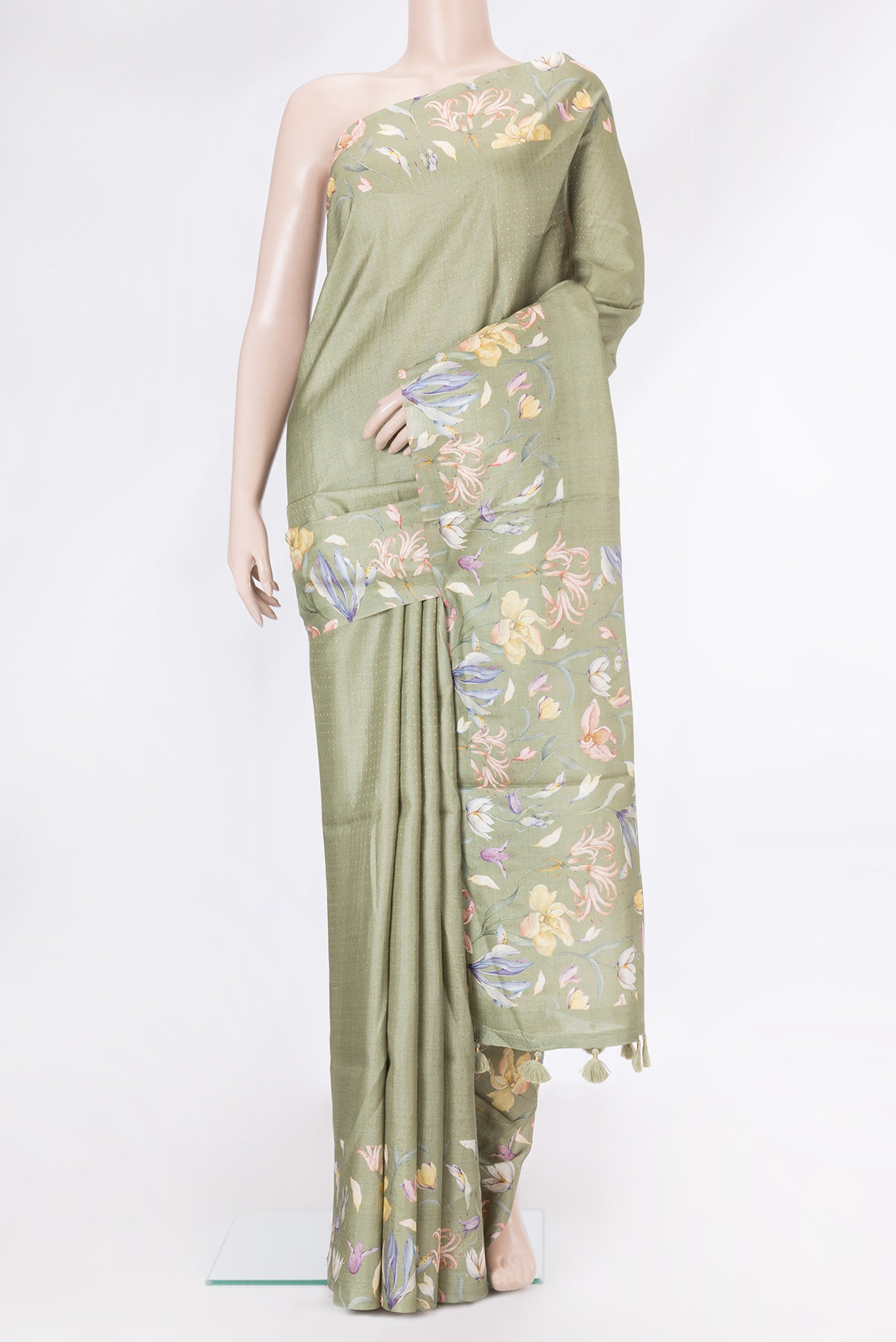 Sage Green Dual Tone Tussar Silk Saree with Stripes on the body and Zari Border.  displayed on a mannequin