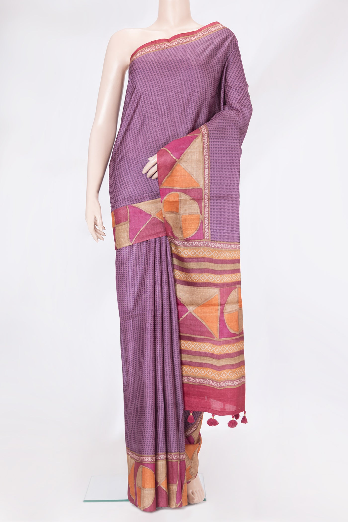 Purple Tussar Silk Saree with Printed design on the body and Printed Border.  displayed on a mannequin