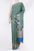 Green Tussar Silk Saree with Plain Body and Fancy Border.  displayed on a mannequin