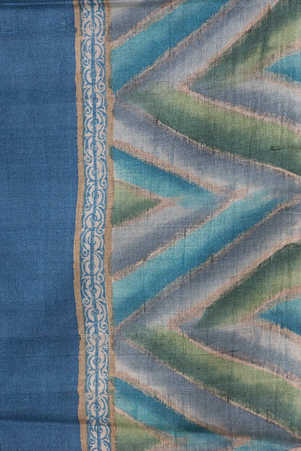 Border image of Navy Blue Dual Tone Tussar Silk Saree with Plain Body and Printed Border. 