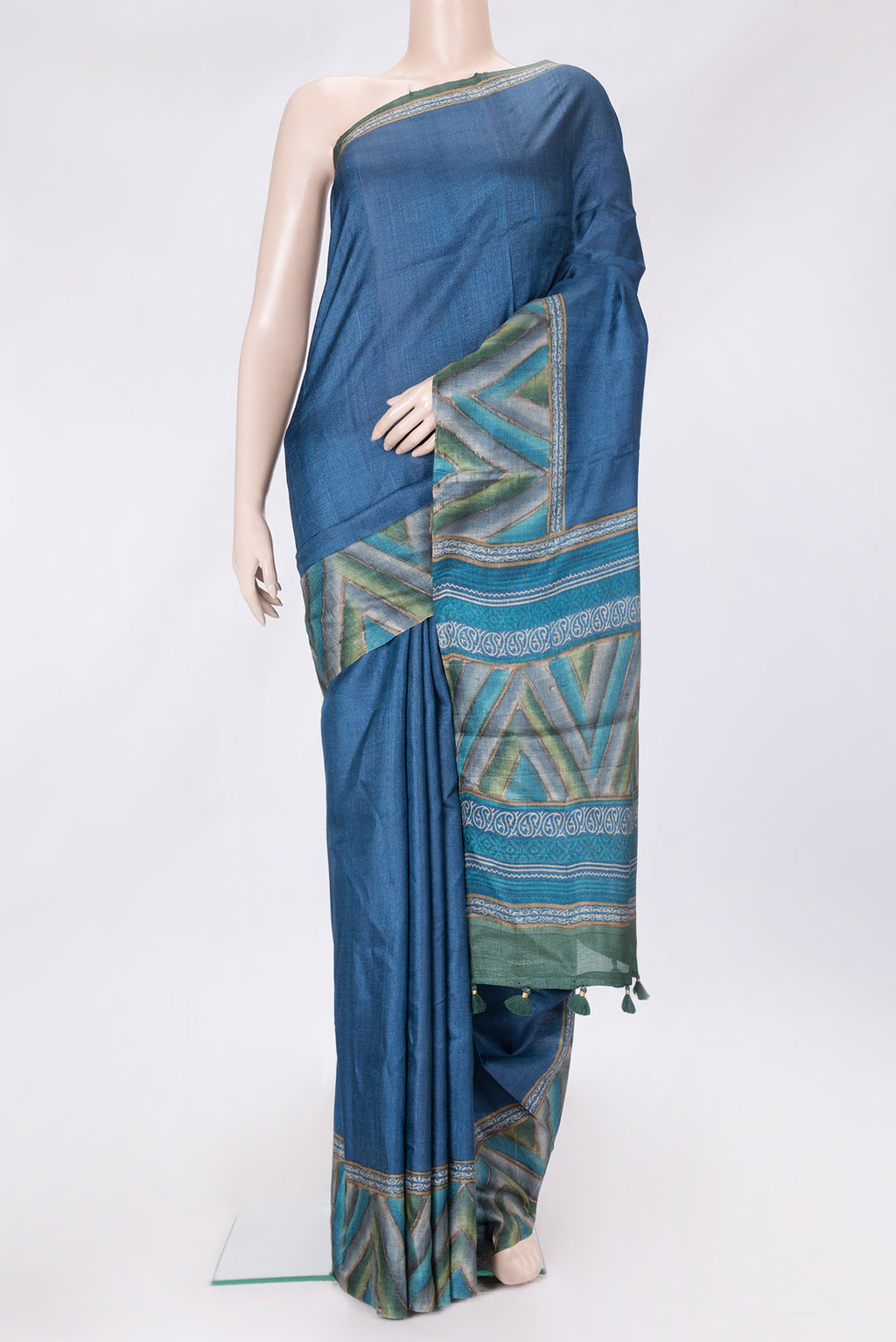 Navy Blue Dual Tone Tussar Silk Saree with Plain Body and Printed Border.  displayed on a mannequin