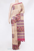 Beige Tussar Silk Saree with Printed design on the body and Fancy Border.  displayed on a mannequin