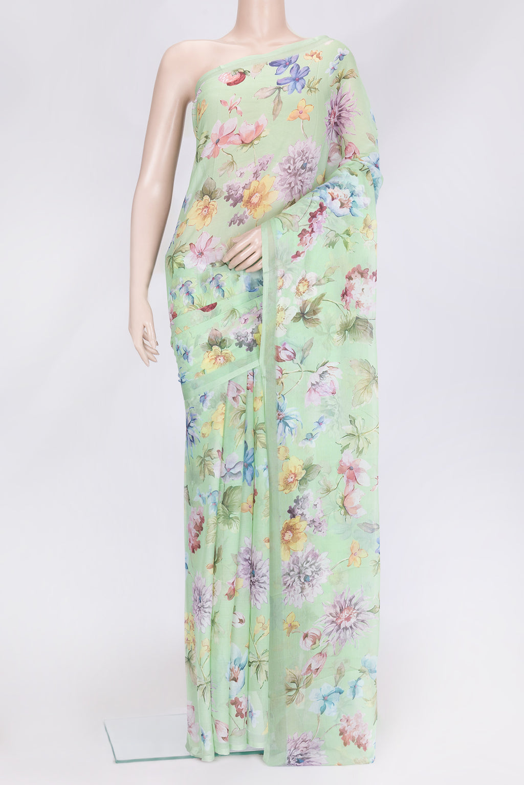Pista Green Dual Tone Chiffon Saree with Printed design on the body and Without Border.  displayed on a mannequin
