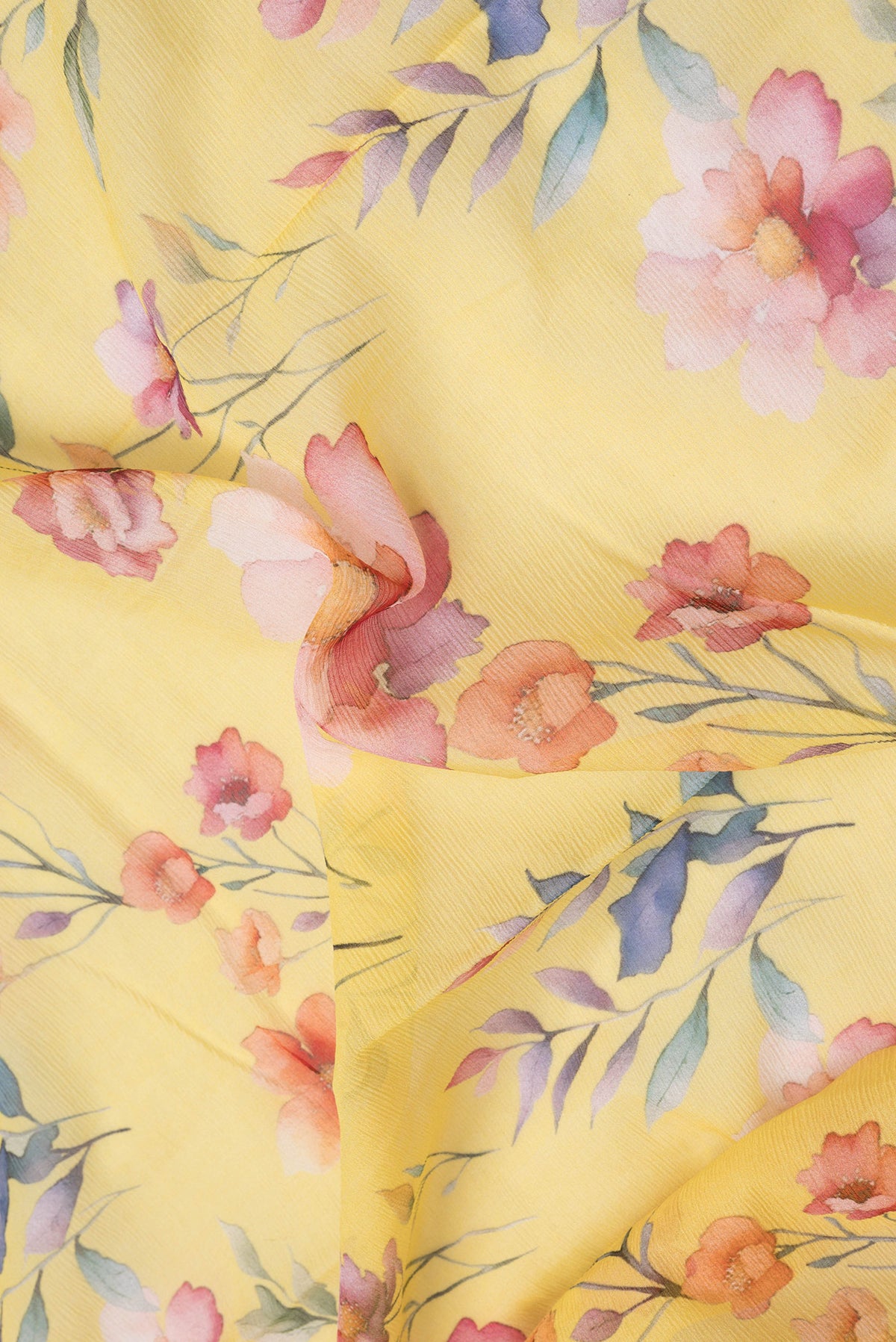 Close up of Lemon Yellow Dual Tone Mysore Chiffon Saree with Floral Print on the body and Without Border.  displaying folds