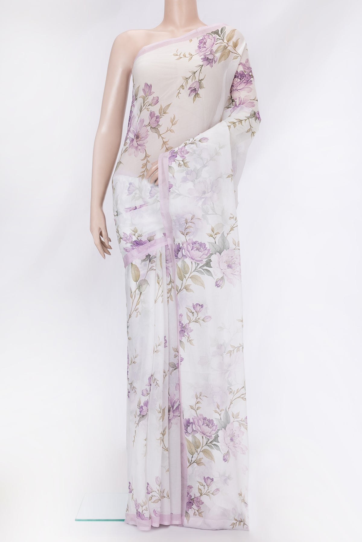 Off White Mysore Chiffon Saree with Floral Print on the body and Plain Border.  displayed on a mannequin