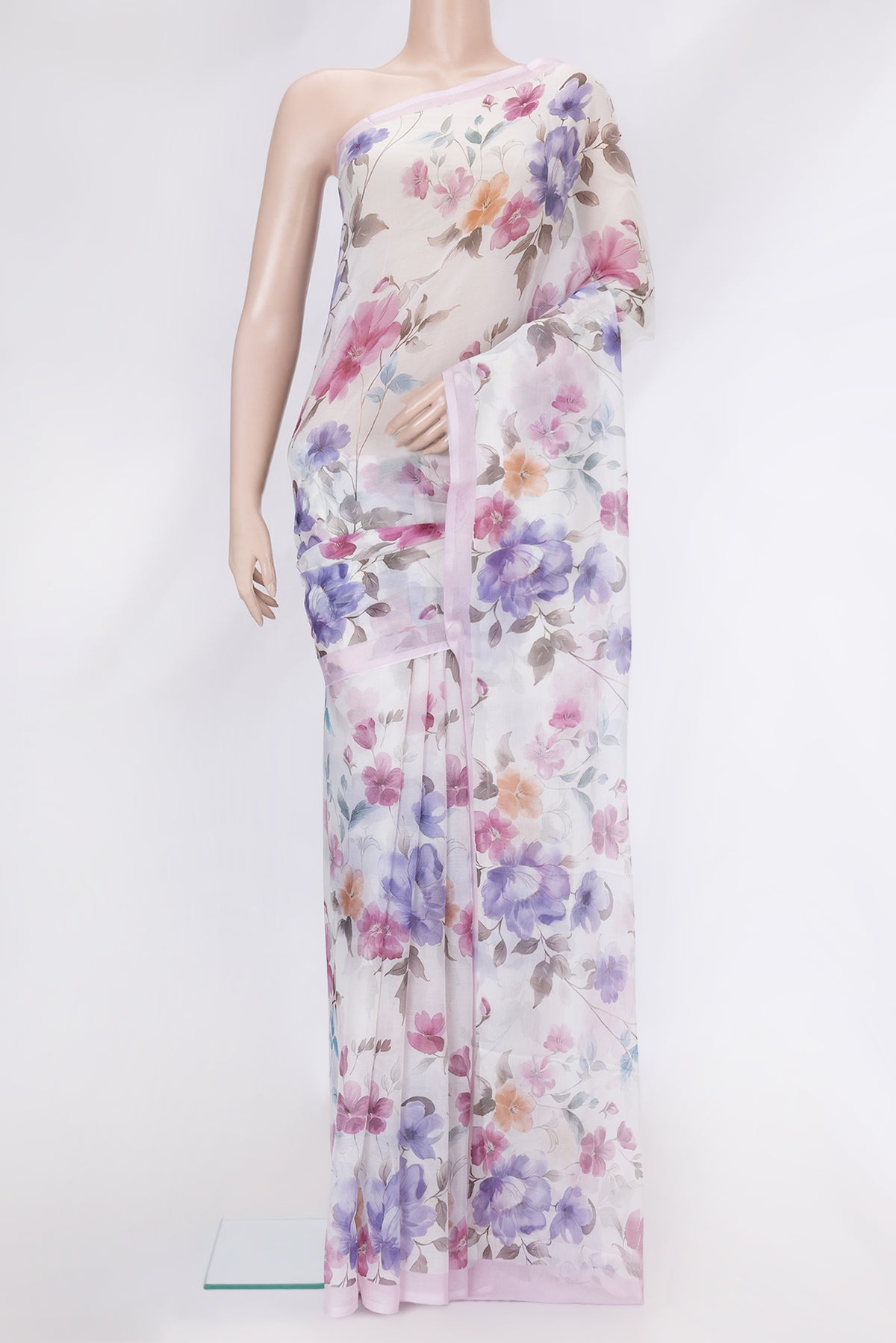 Off White Mysore Chiffon Saree with Printed design on the body and Plain Border.  displayed on a mannequin