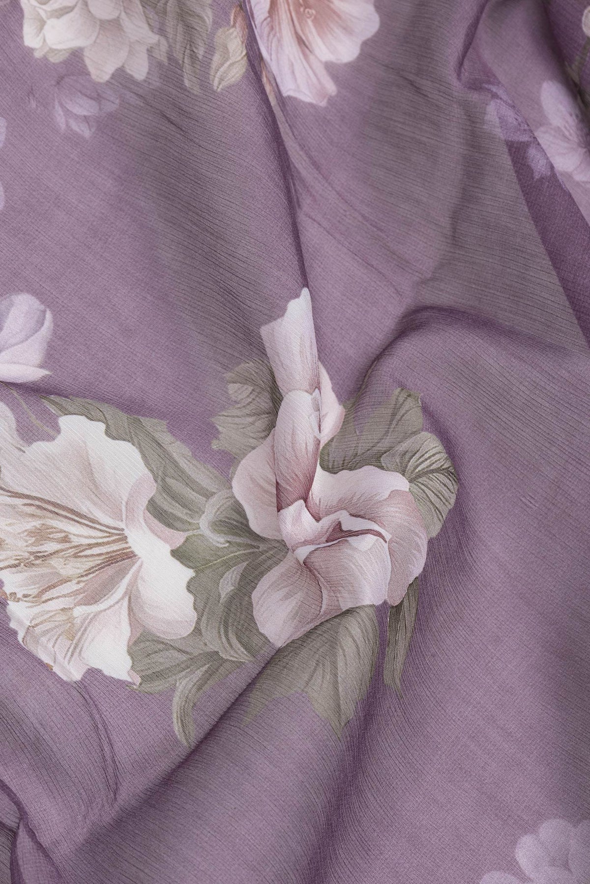 Close up of Purple Dual Tone Mysore Chiffon Saree with Printed design on the body and Plain Border.  displaying folds
