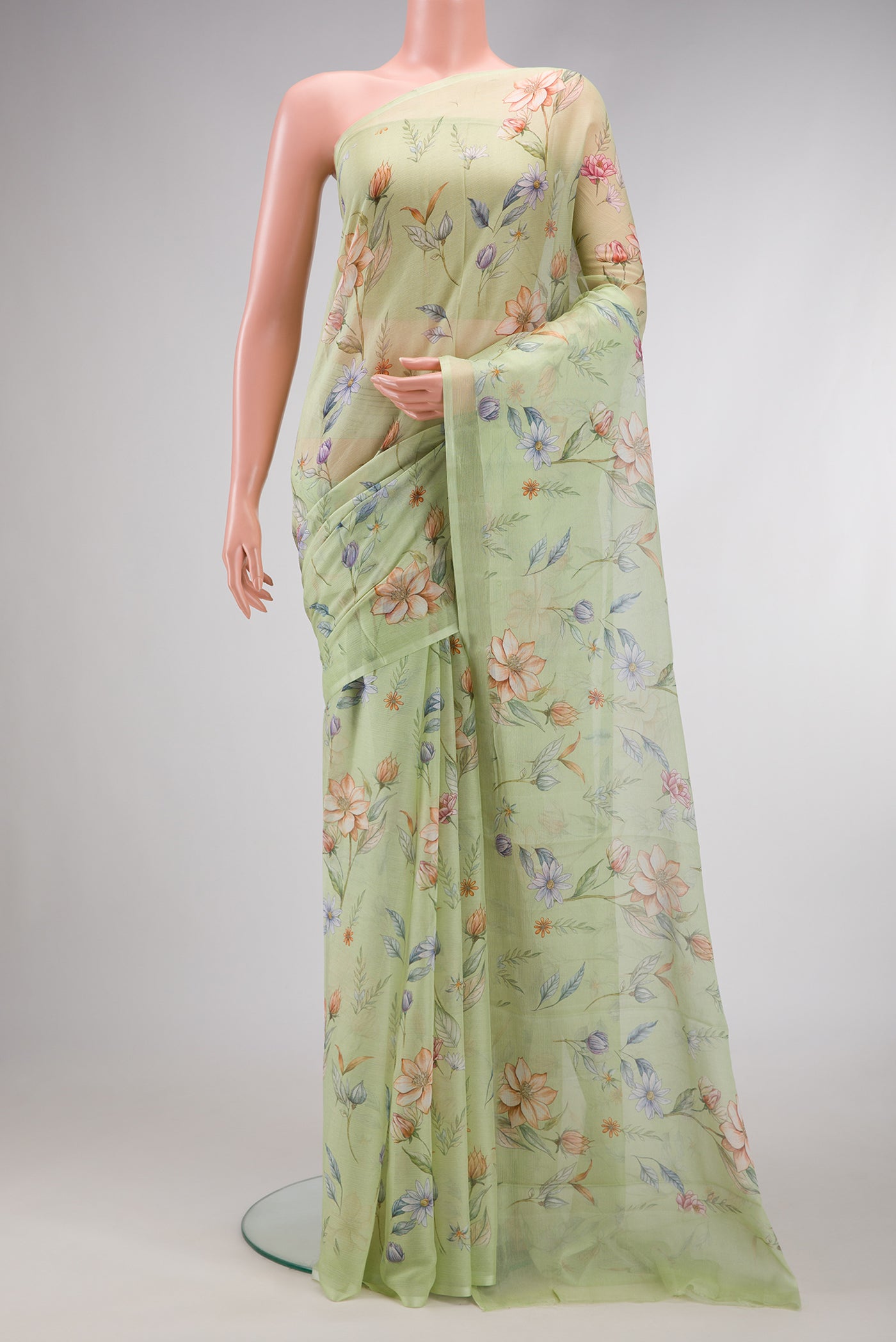 Light Green Dual Tone Mysore Chiffon Saree with Printed design on the body and Without Border.  displayed on a mannequin