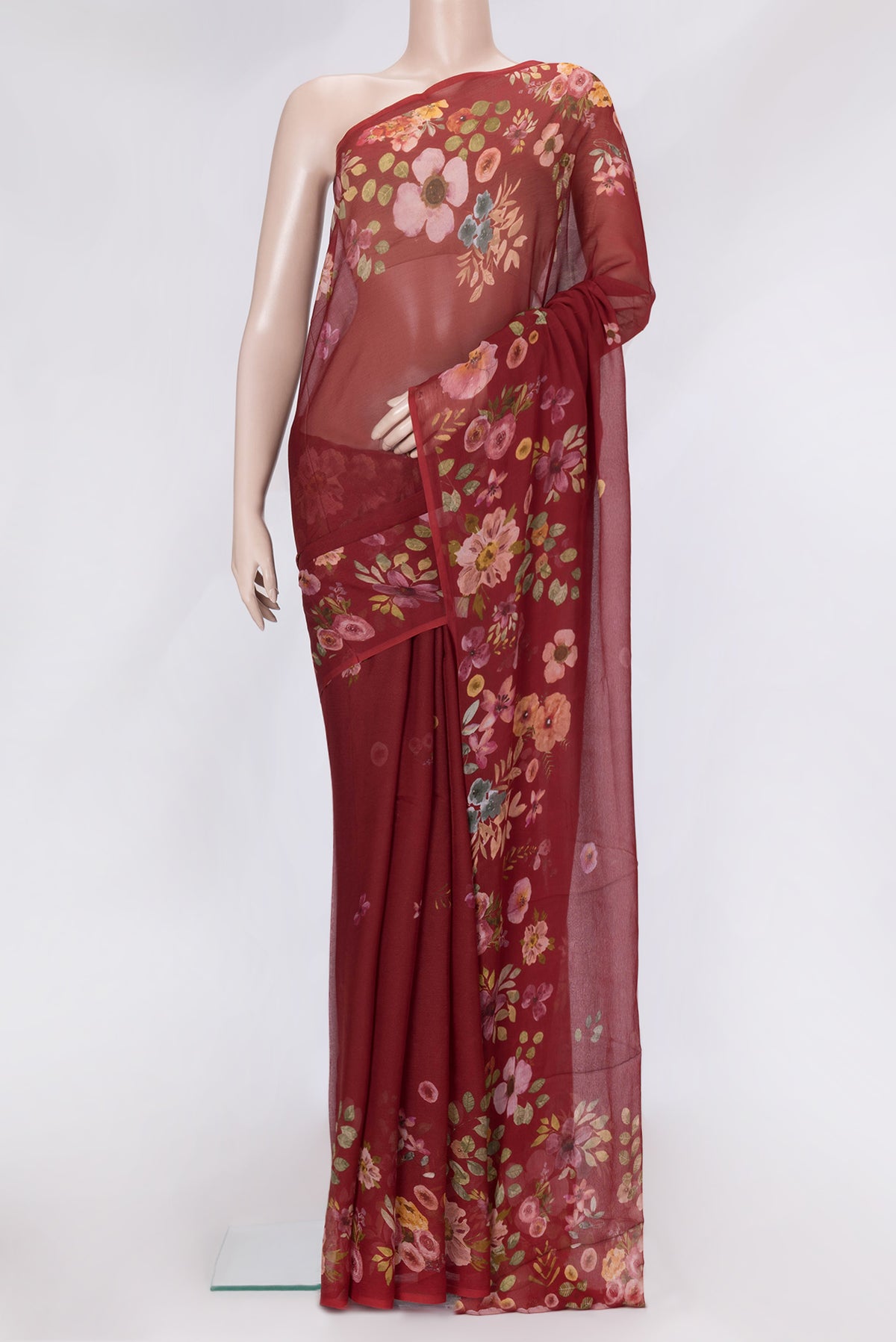 Maroon Dual Tone Mysore Chiffon Saree with Printed design on the body and Without Border.  displayed on a mannequin