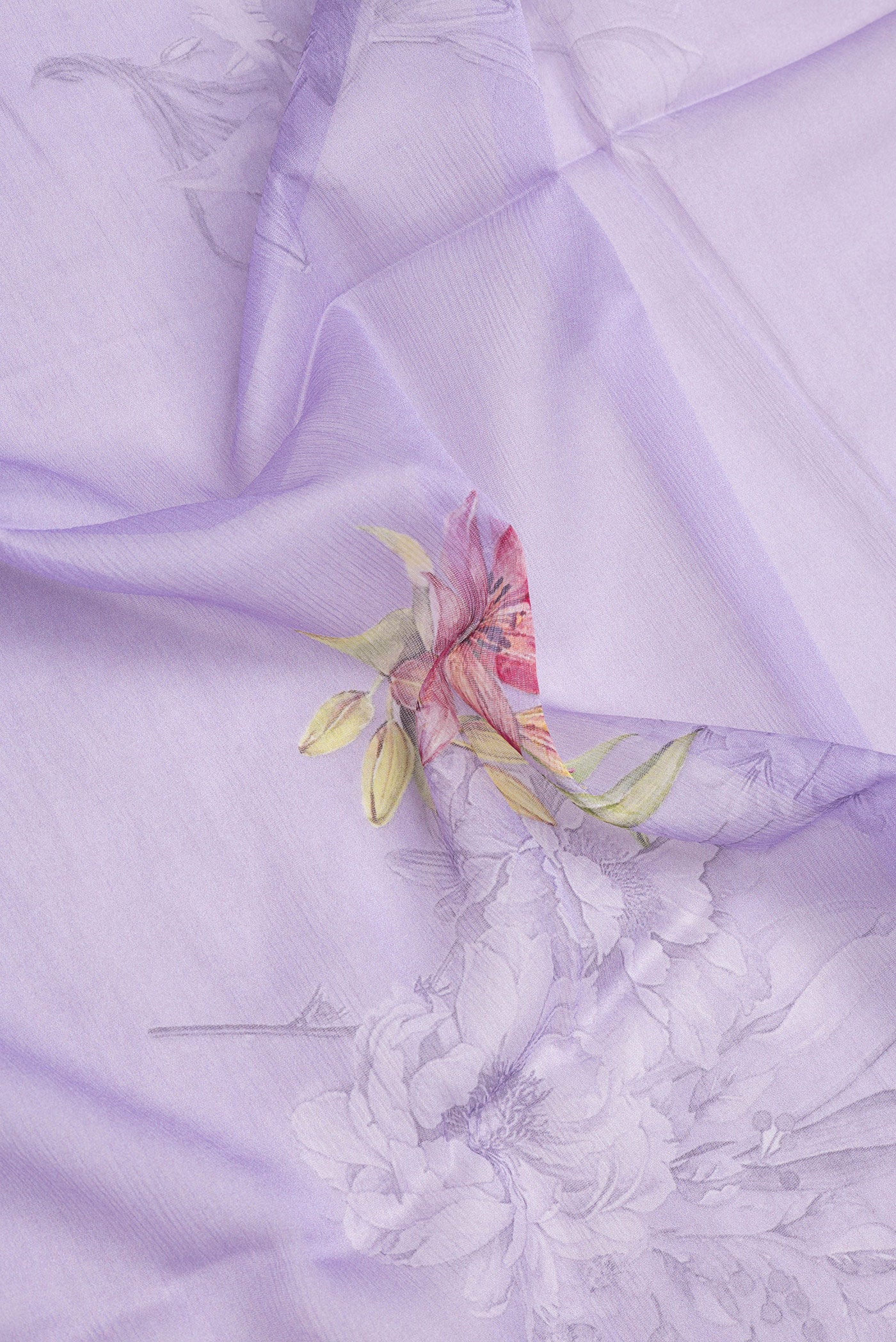 Close up of Lavender Mysore Chiffon Saree with Printed design on the body and Without Border.  displaying folds
