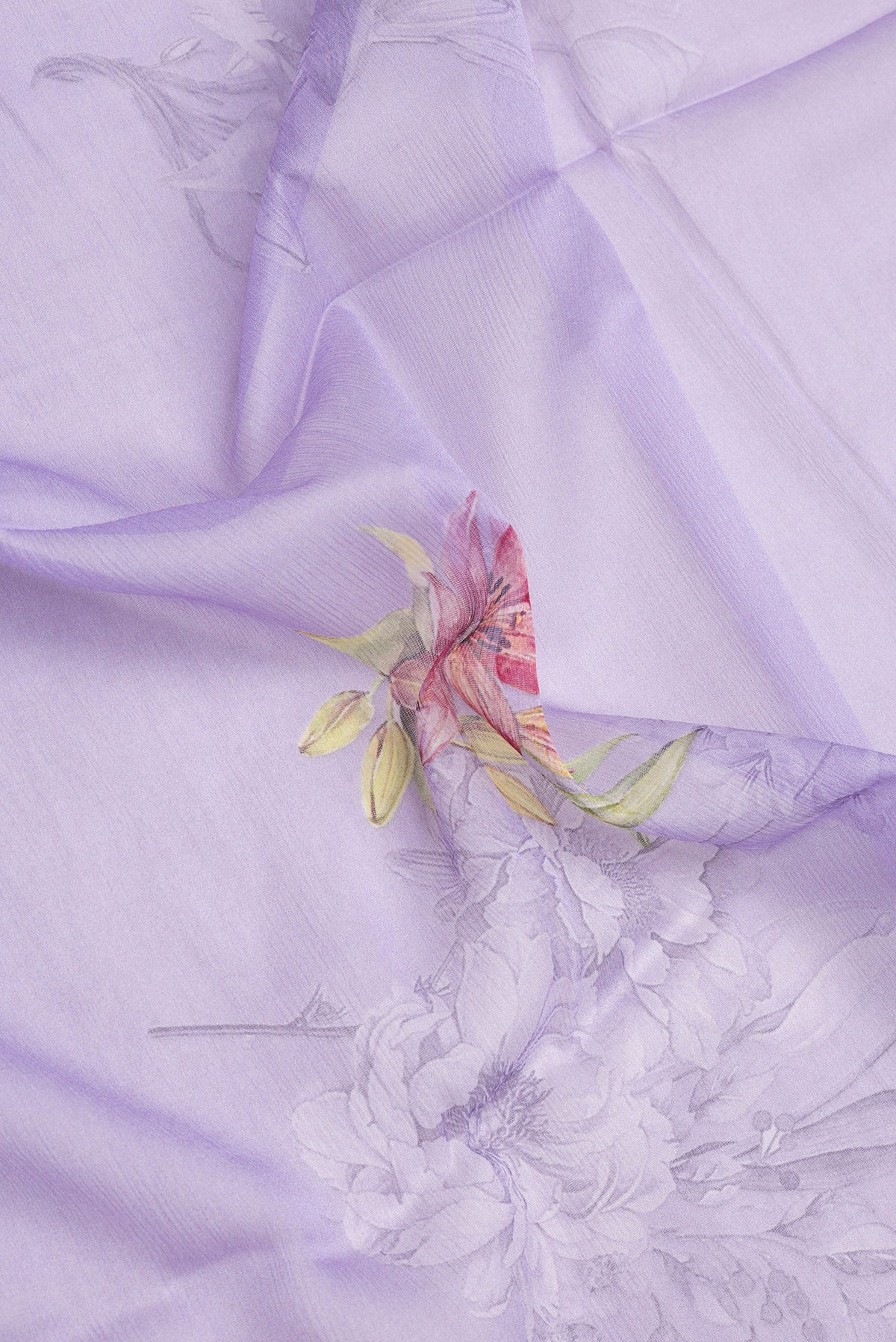 Close up of Lavender Mysore Chiffon Saree with Printed design on the body and Without Border.  displaying folds