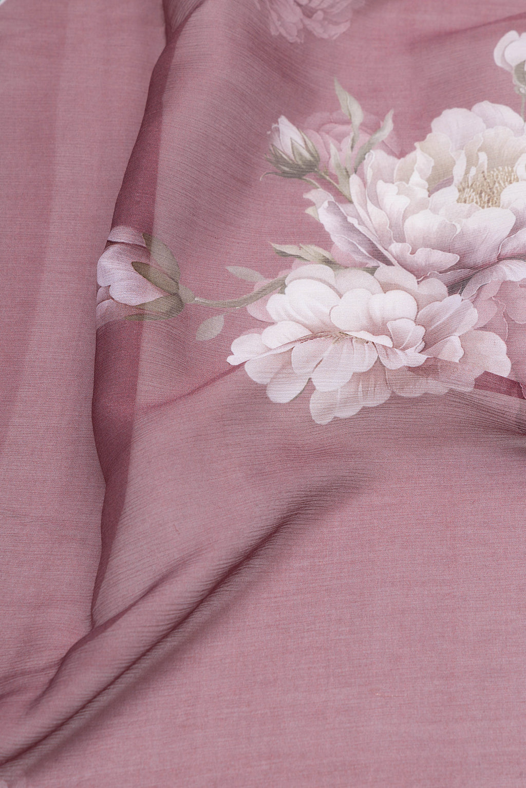 Close up of Mauve Mysore Chiffon Saree with Floral Print on the body and Plain Border.  displaying folds