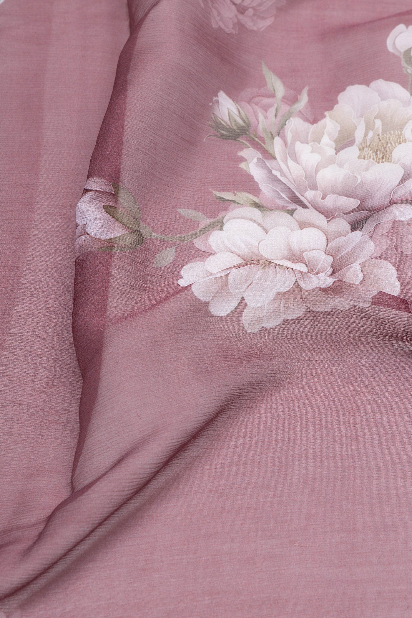 Close up of Mauve Mysore Chiffon Saree with Floral Print on the body and Plain Border.  displaying folds