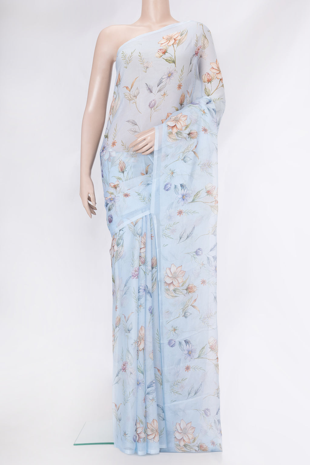 Sky Blue Dual Tone Mysore Chiffon Saree with Printed design on the body and Without Border.  displayed on a mannequin