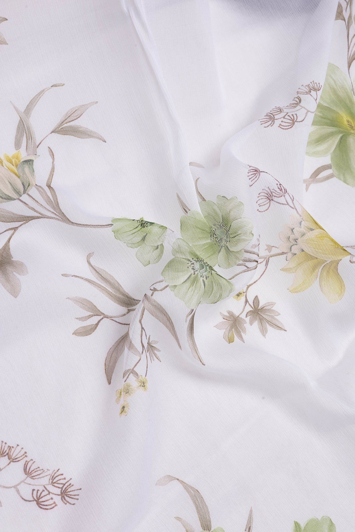 Close up of Off White Dual Tone Mysore Chiffon Saree with Printed design on the body and Plain Border.  displaying folds