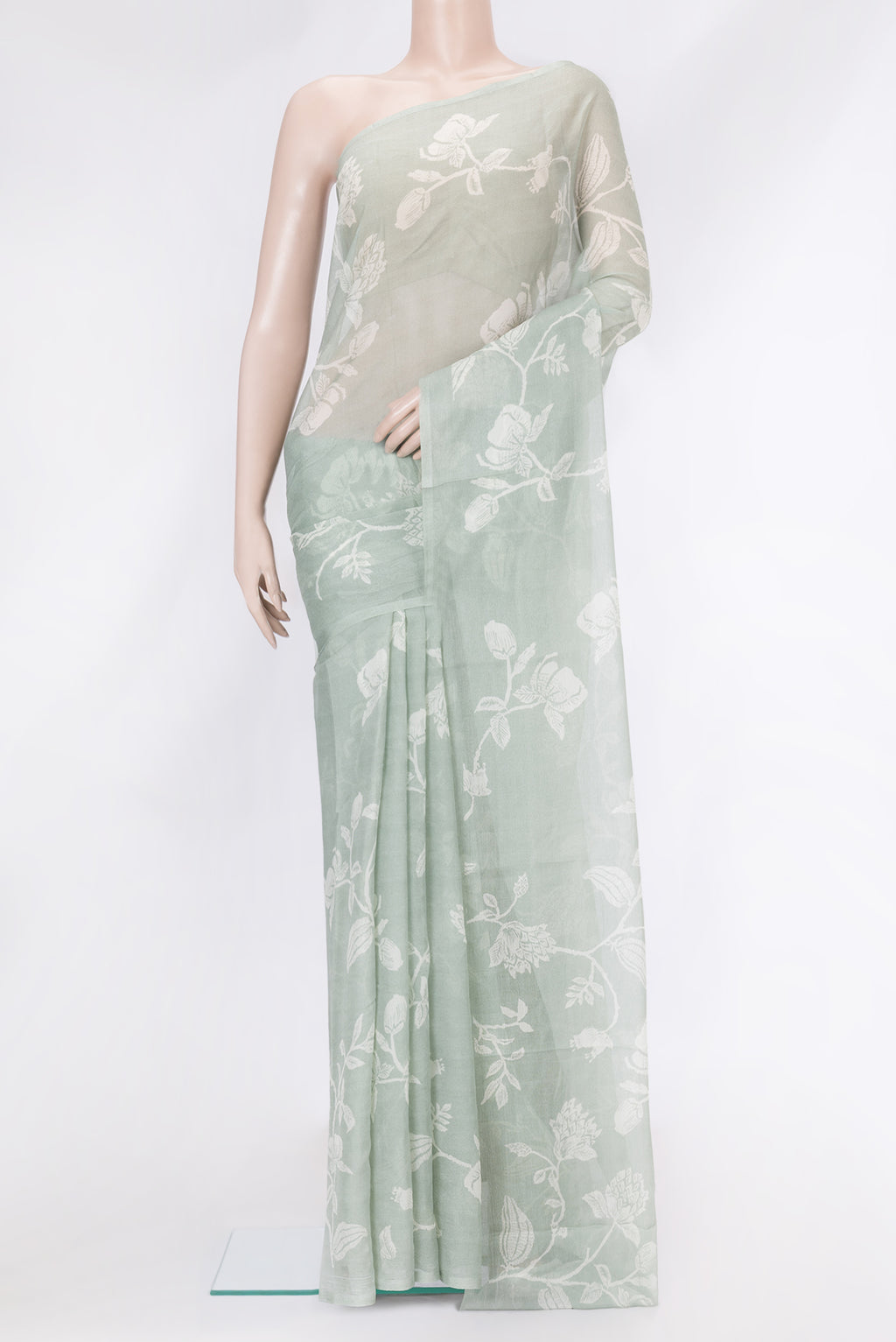 Light Green Mysore Chiffon Saree with Printed design on the body and Without Border.  displayed on a mannequin
