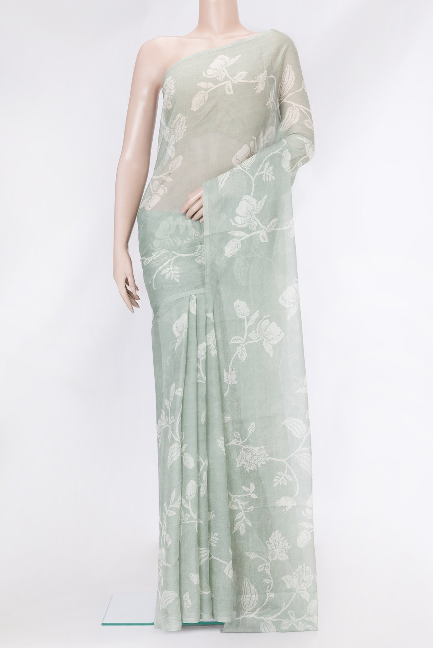 Light Green Mysore Chiffon Saree with Printed design on the body and Without Border.  displayed on a mannequin