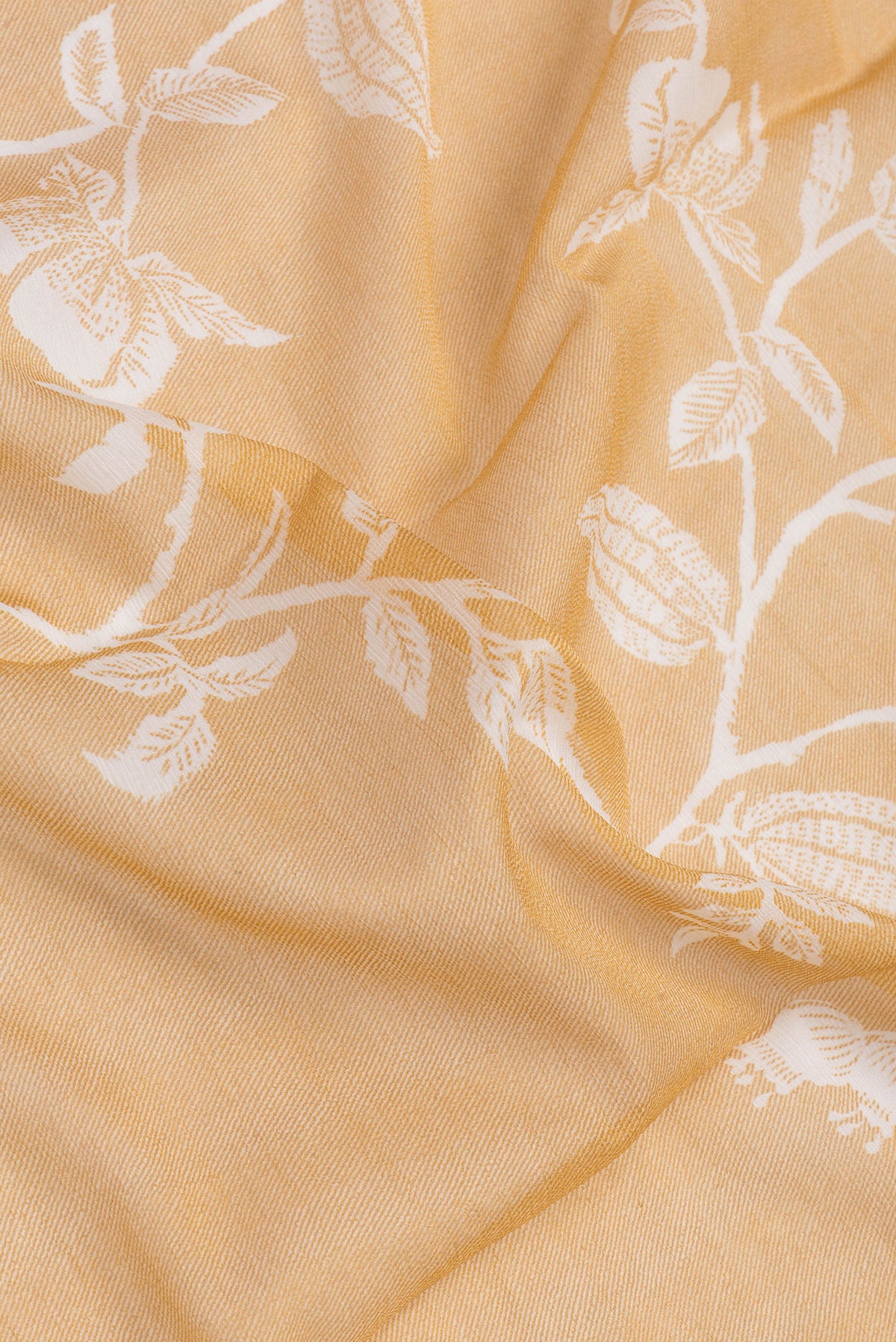 Close up of Sandal Mysore Chiffon Saree with Printed design on the body and Without Border.  displaying folds